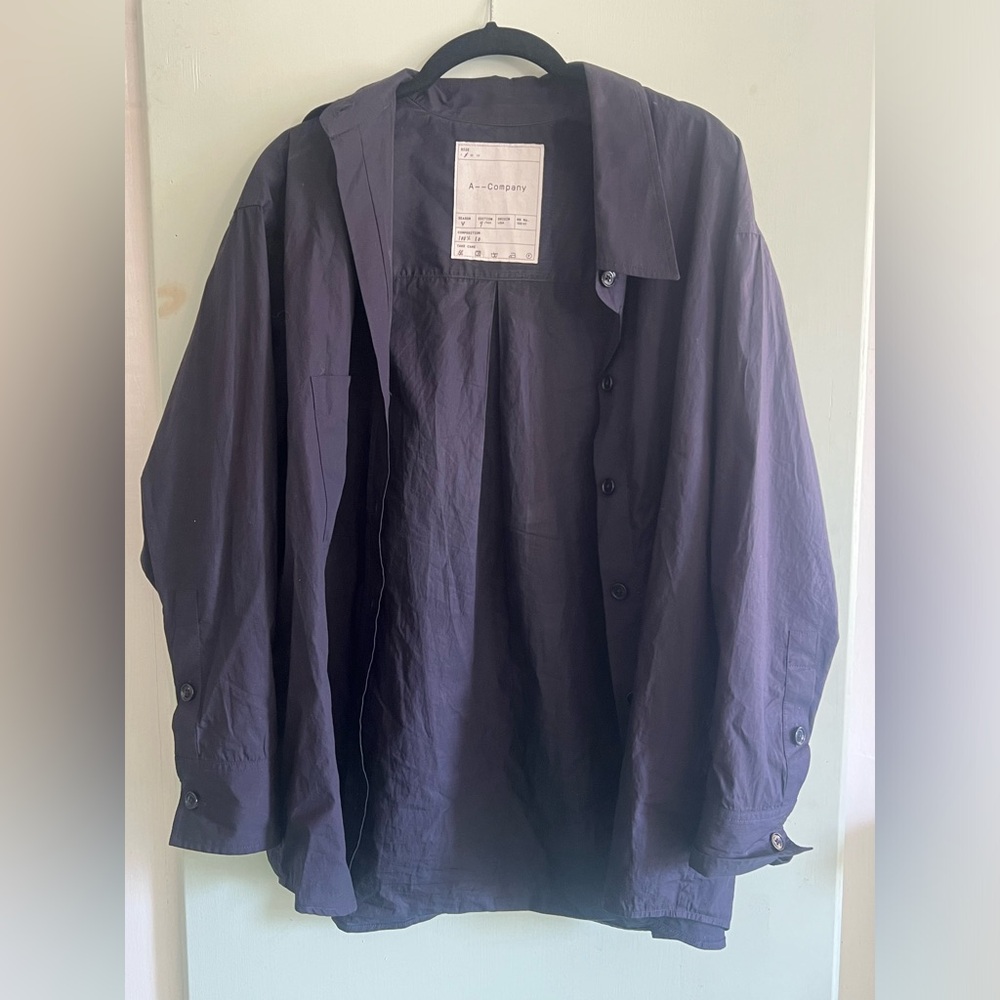 A—company designer Sara Lopez navy Shirt